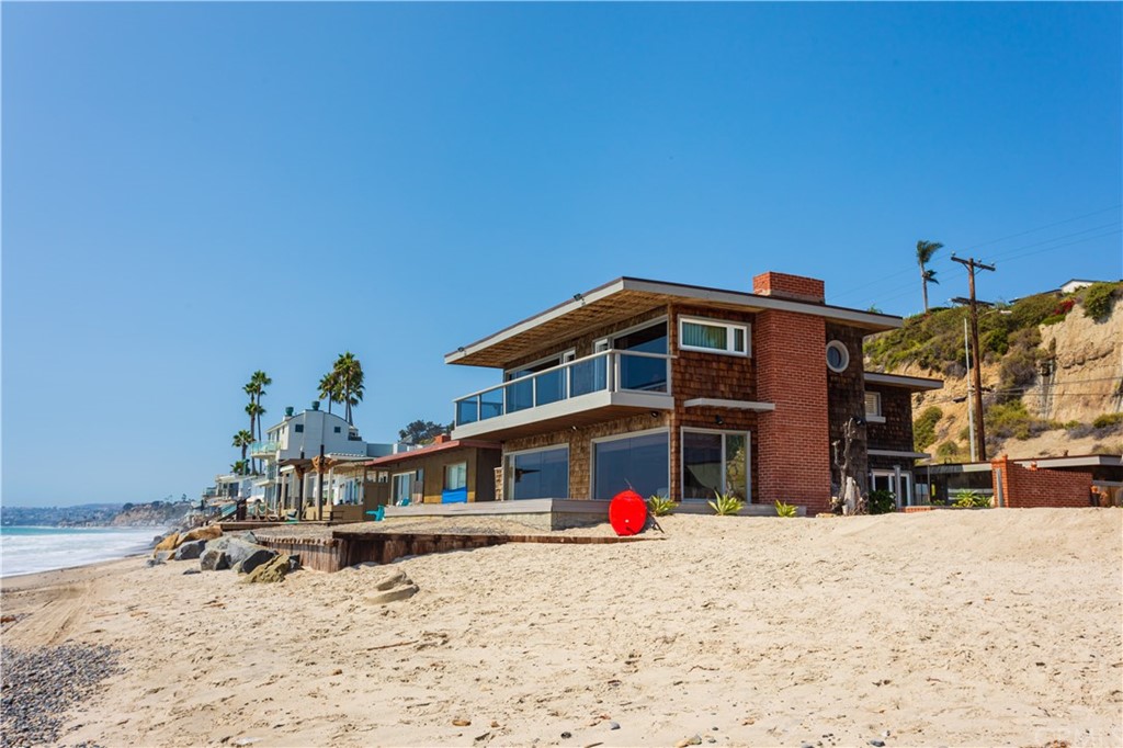 35811 Beach Road Dana Point, CA 92624 - Photo 26 of 41 a front view of a building with a yard