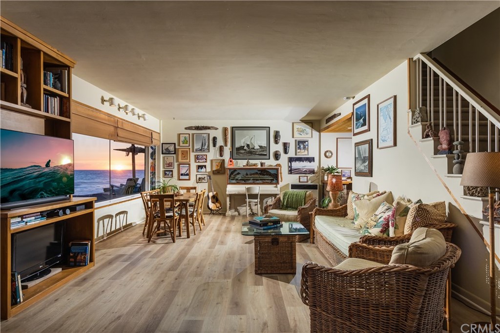 35811 Beach Road Dana Point, CA 92624 - Photo 36 of 41 a living room with fireplace furniture and a flat screen tv