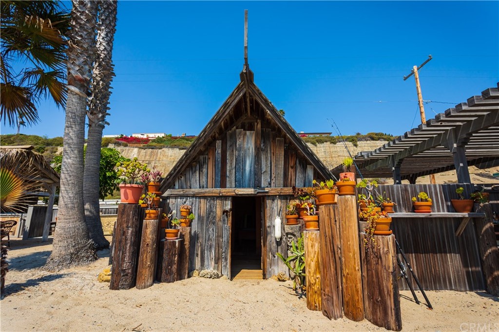 35811 Beach Road Dana Point, CA 92624 - Photo 7 of 41 a view of a house with wooden stairs