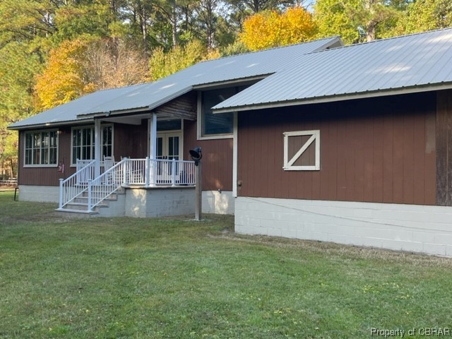 173 Lillys Neck Road Moon, VA 23119 - Photo 46 of 48 Ranch-style house featuring a front yard