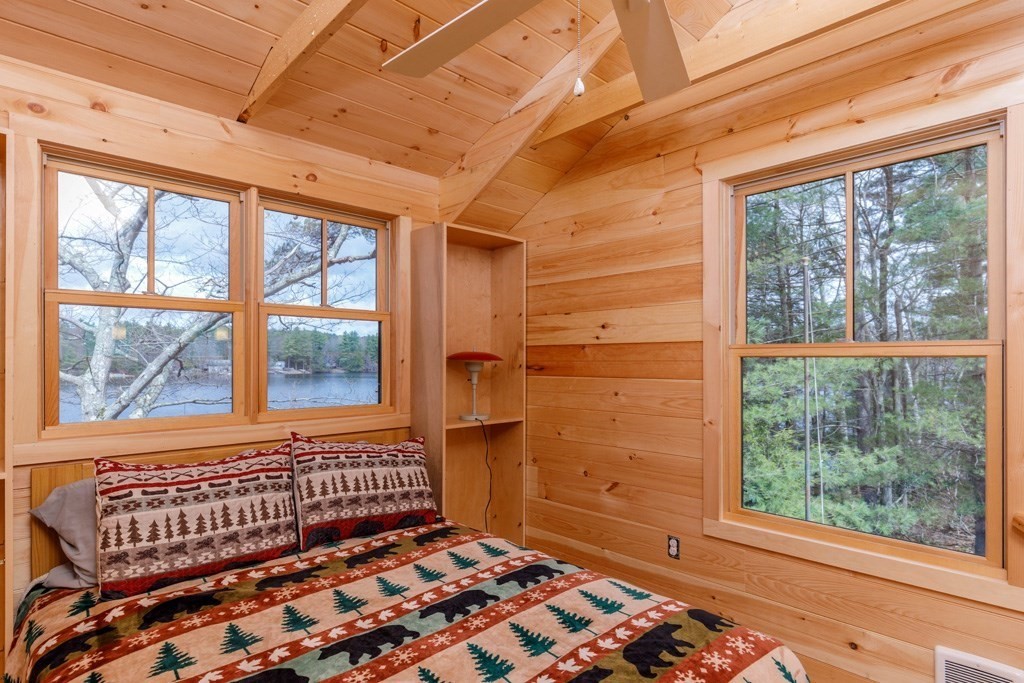 213 Ashby Road Ashburnham, MA 01430 - Photo 12 of 28 a view of a bedroom with a large window