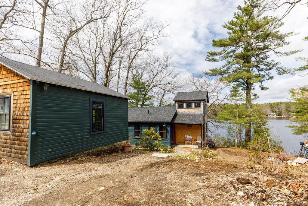 213 Ashby Road Ashburnham, MA 01430 - Photo 21 of 28 a view of a house with a yard and garage