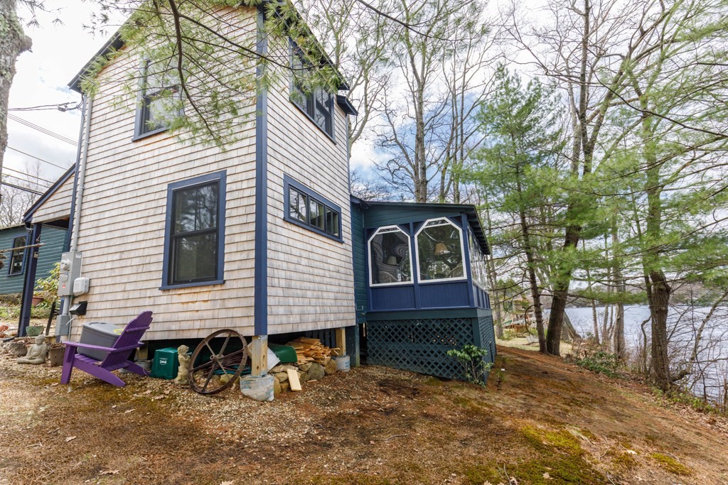 213 Ashby Road Ashburnham, MA 01430 - Photo 23 of 28 a front view of a house with a yard
