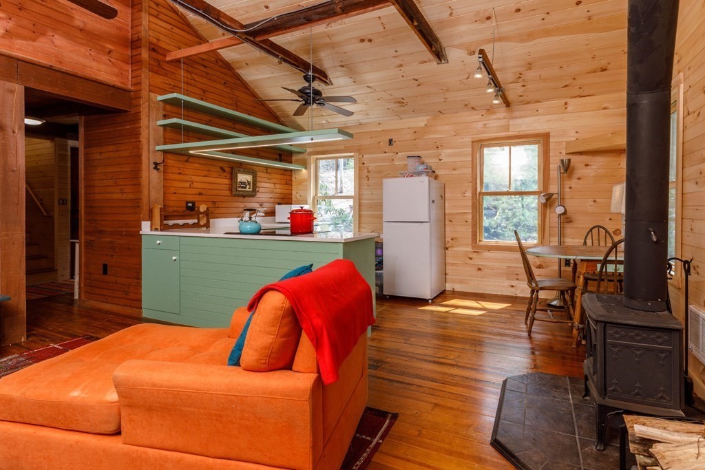 213 Ashby Road Ashburnham, MA 01430 - Photo 6 of 28 a bedroom with furniture and wooden floor