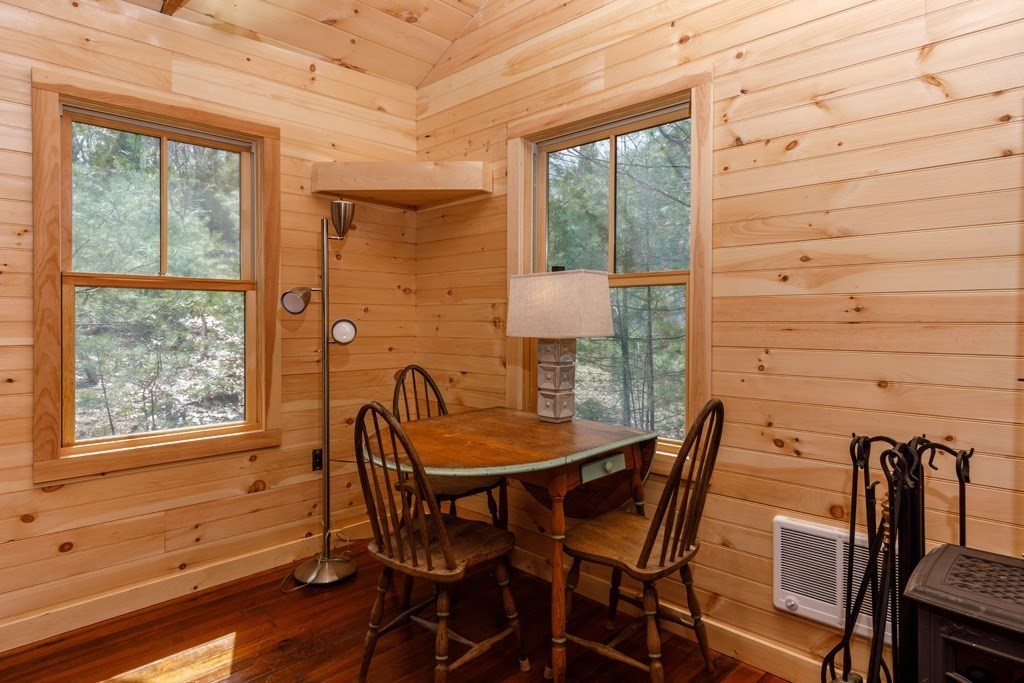 213 Ashby Road Ashburnham, MA 01430 - Photo 8 of 28 a view of a dining room with furniture window and outside view