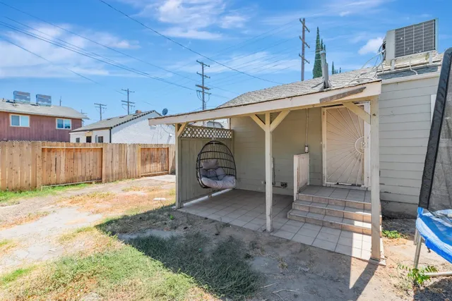 a view of a house with a patio