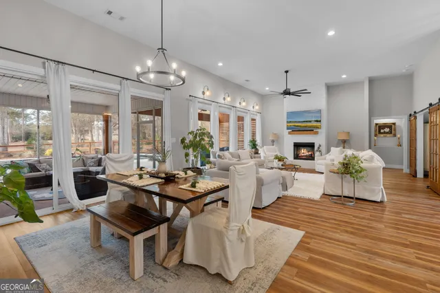a kitchen with stainless steel appliances a refrigerator sink and cabinets