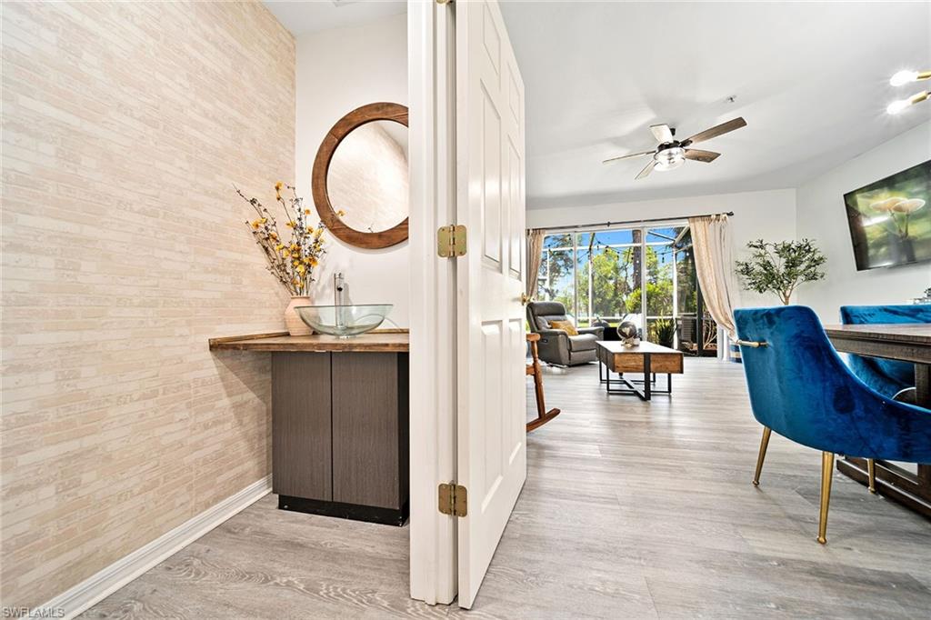 816 Hampton Circle Naples, FL 34105 - Photo 24 of 49 a view of a livingroom with furniture and a large window