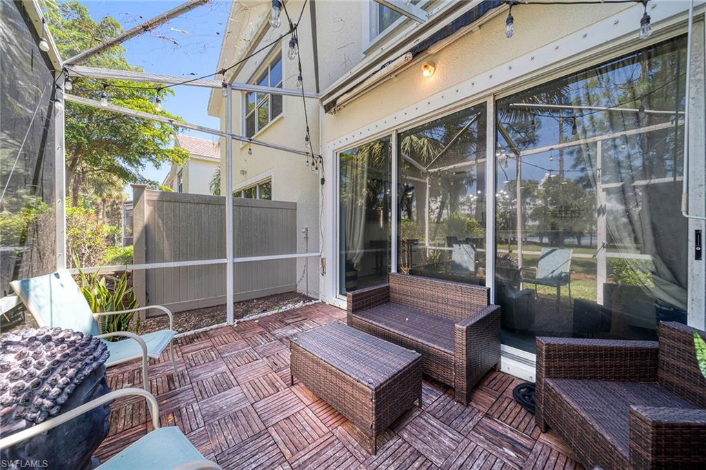 816 Hampton Circle Naples, FL 34105 - Photo 33 of 49 a view of a chairs in the balcony