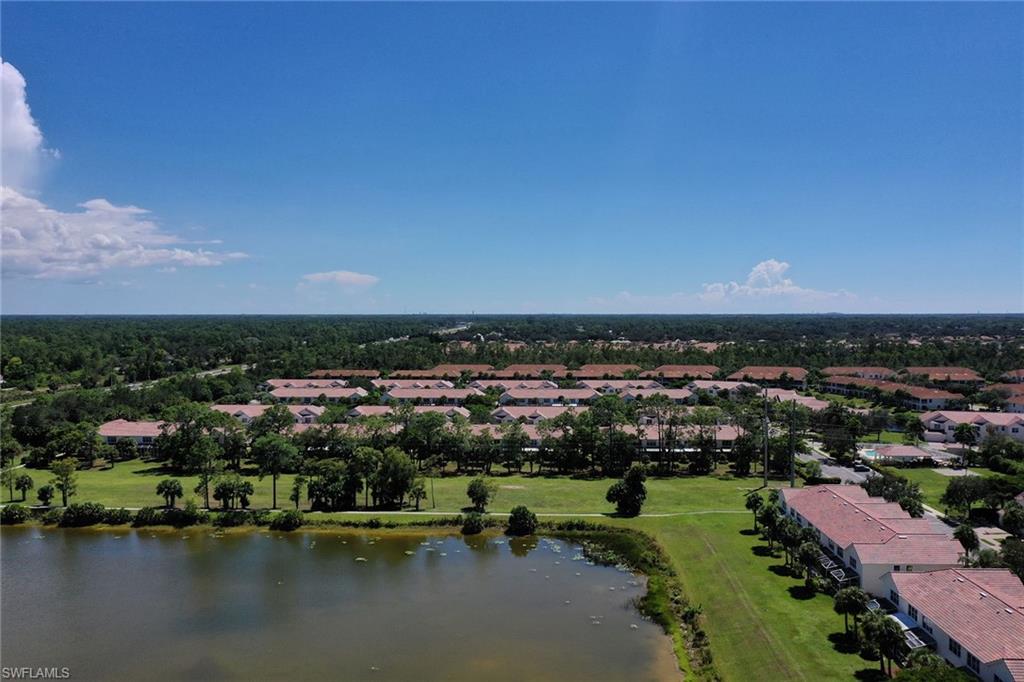 816 Hampton Circle Naples, FL 34105 - Photo 39 of 49 an aerial view of a city with a lake view