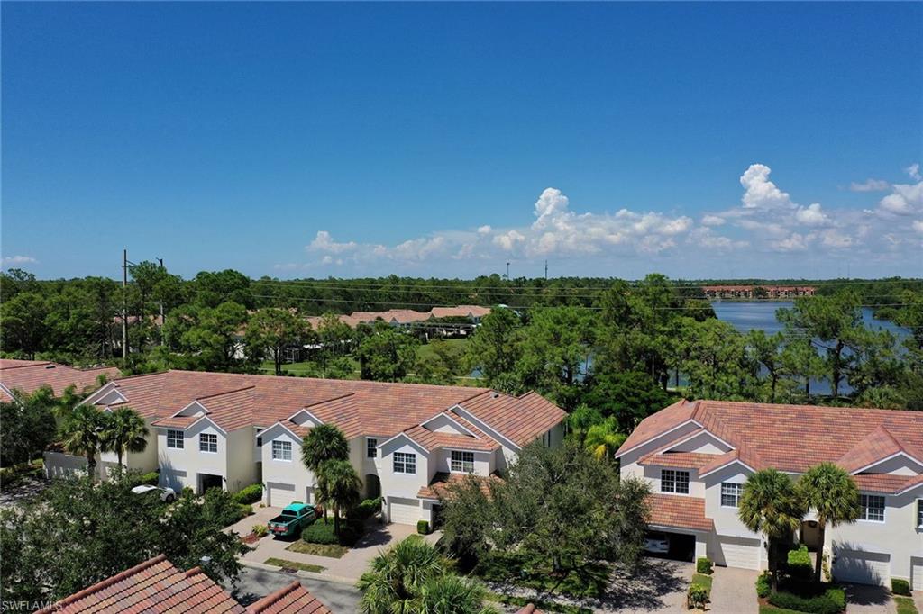 816 Hampton Circle Naples, FL 34105 - Photo 41 of 49 a view of house with a garden