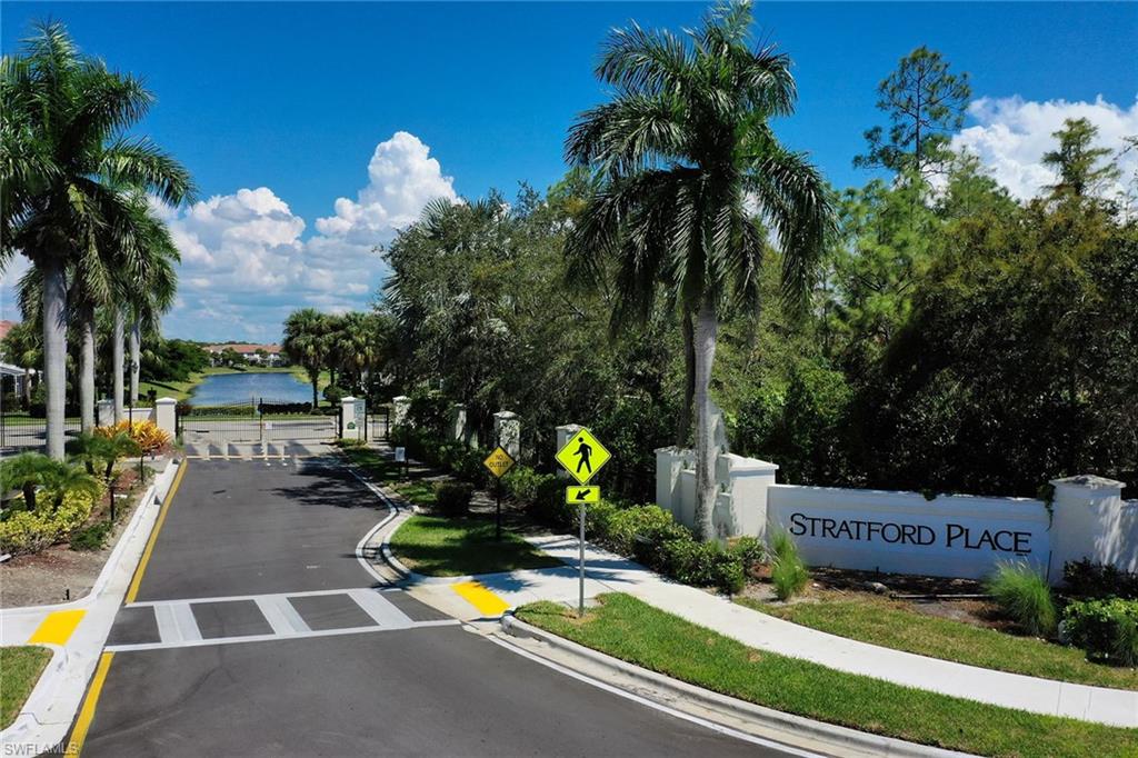 816 Hampton Circle Naples, FL 34105 - Photo 46 of 49 a view of a backyard with swimming pool