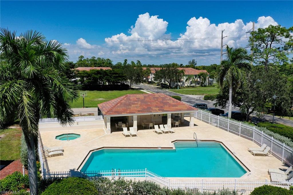 816 Hampton Circle Naples, FL 34105 - Photo 48 of 49 an aerial view of house with yard space and swimming pool