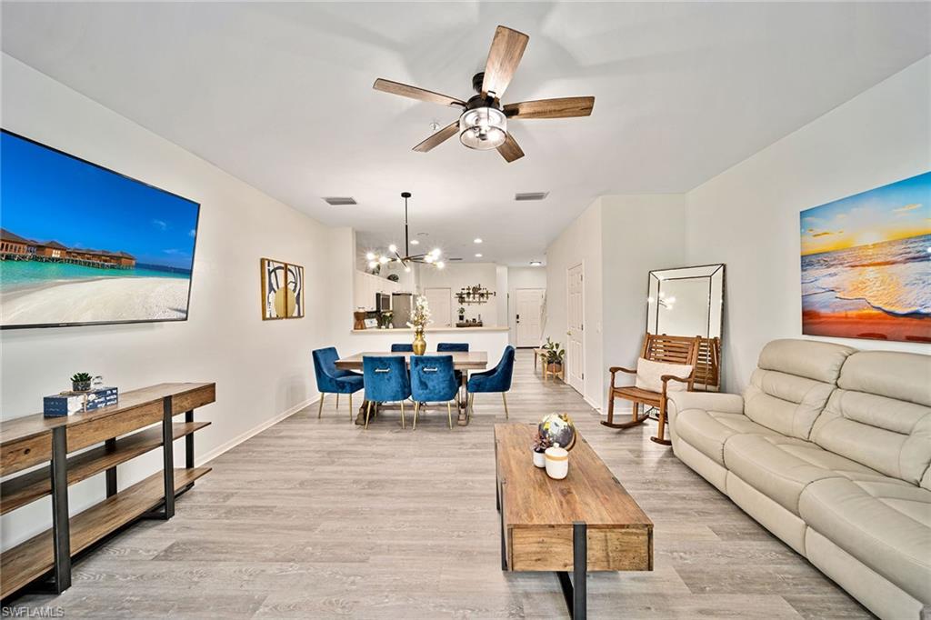 816 Hampton Circle Naples, FL 34105 - Photo 5 of 49 a living room with furniture