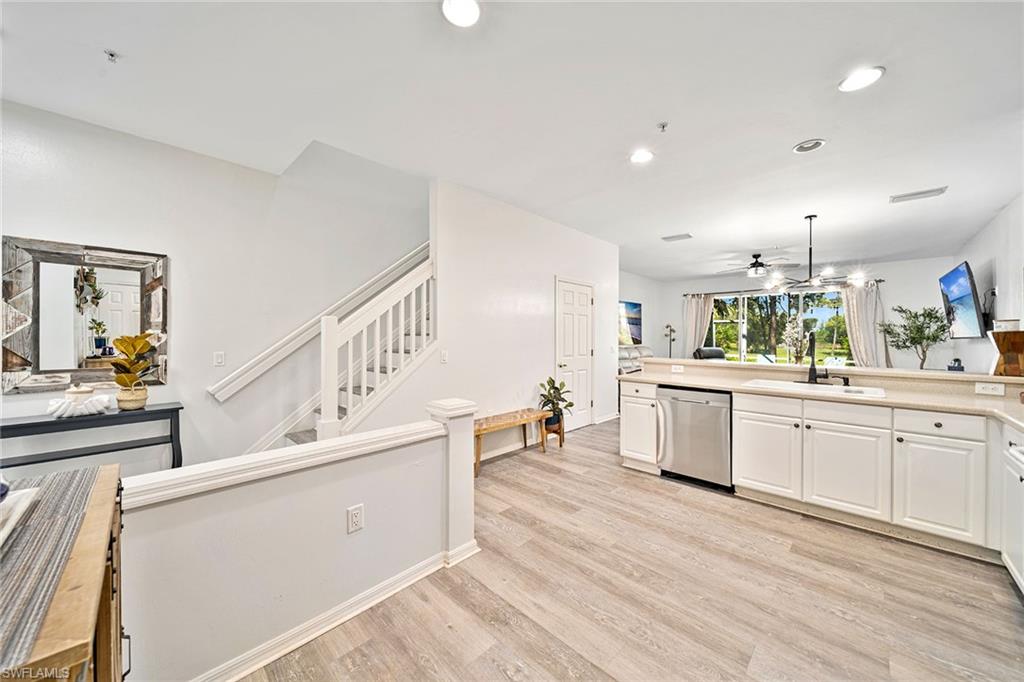 816 Hampton Circle Naples, FL 34105 - Photo 8 of 49 a kitchen with counter top space and cabinets