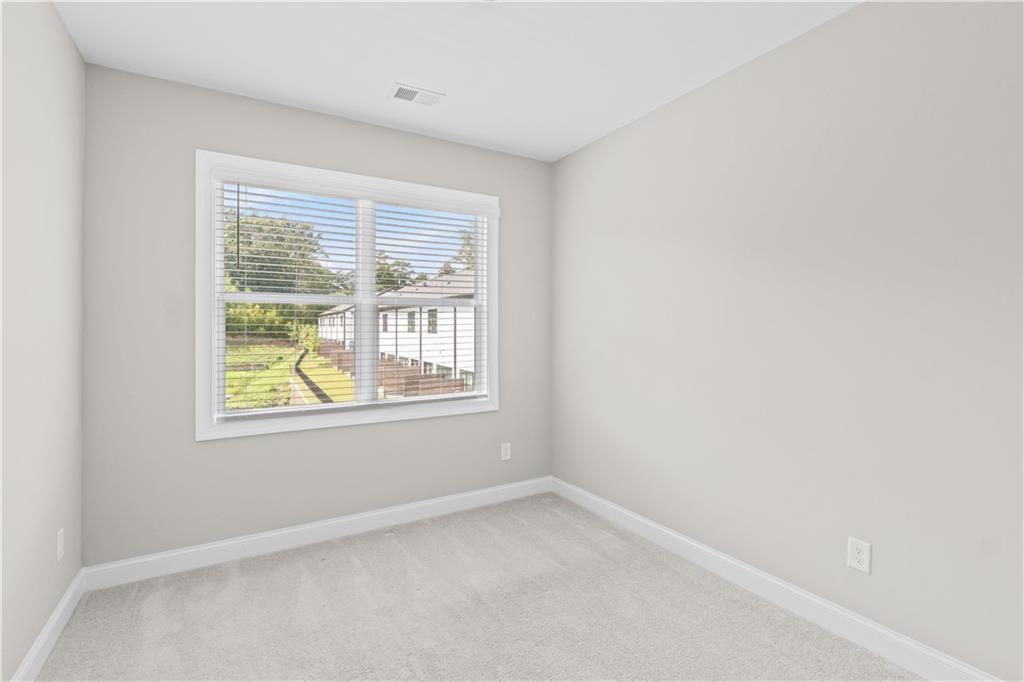 2410 Lakeshore Lane Atlanta, GA 30316 - Photo 14 of 31 an empty room with a window