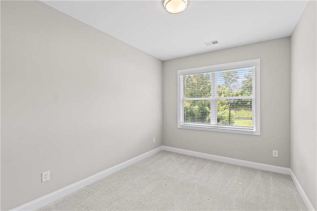 2410 Lakeshore Lane Atlanta, GA 30316 - Photo 16 of 31 an empty room with windows