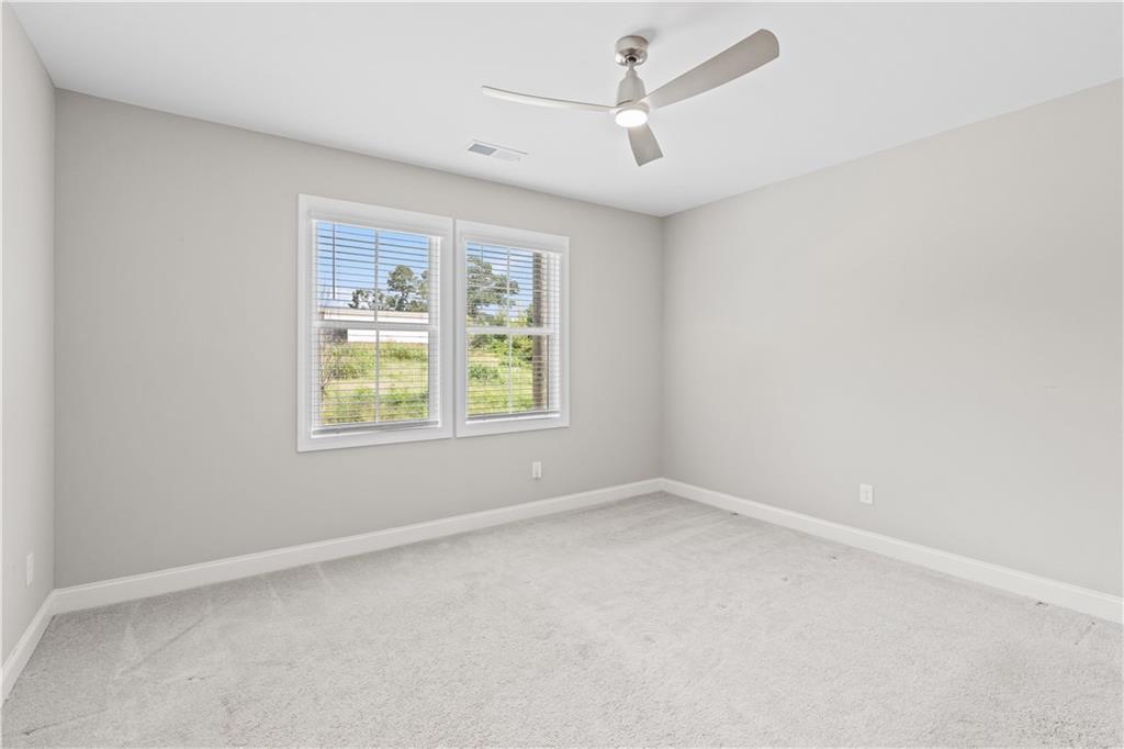 2410 Lakeshore Lane Atlanta, GA 30316 - Photo 20 of 31 an empty room with a window