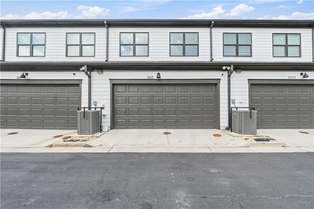2410 Lakeshore Lane Atlanta, GA 30316 - Photo 25 of 31 a front view of a house with a garage