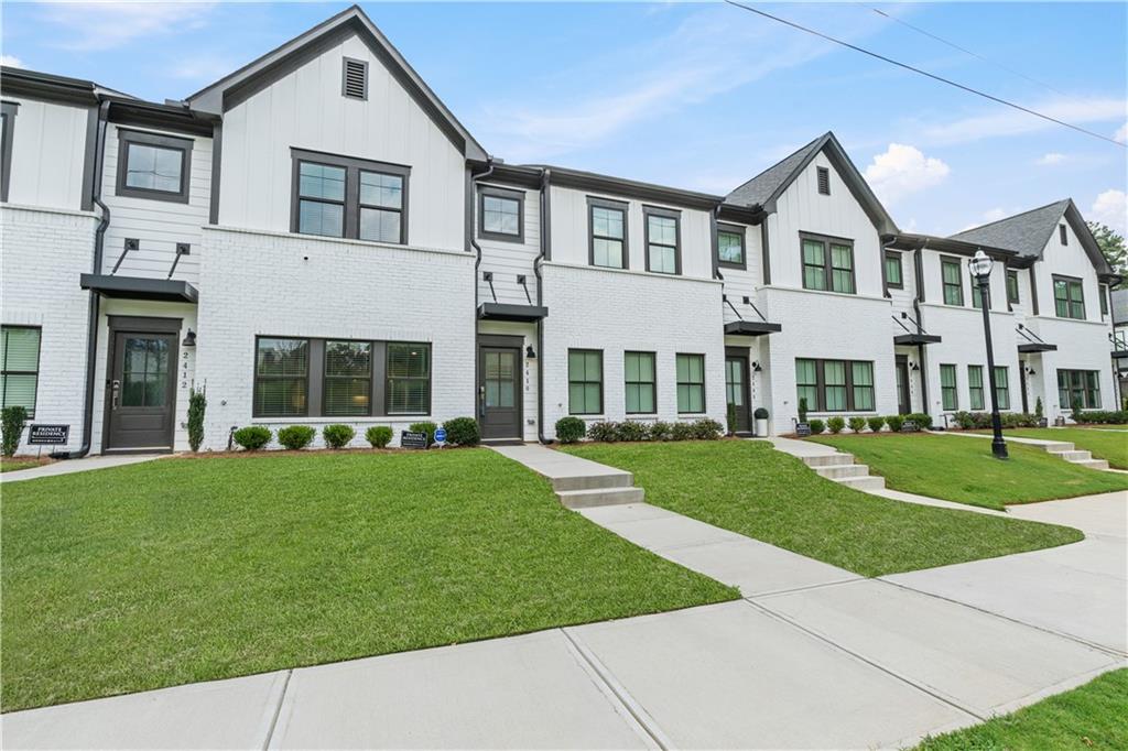 2410 Lakeshore Lane Atlanta, GA 30316 - Photo 3 of 31 front view of a house with a yard