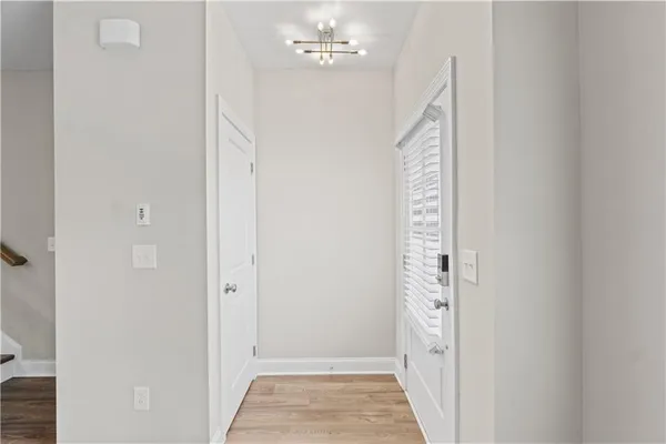 a view of an entryway with chandelier
