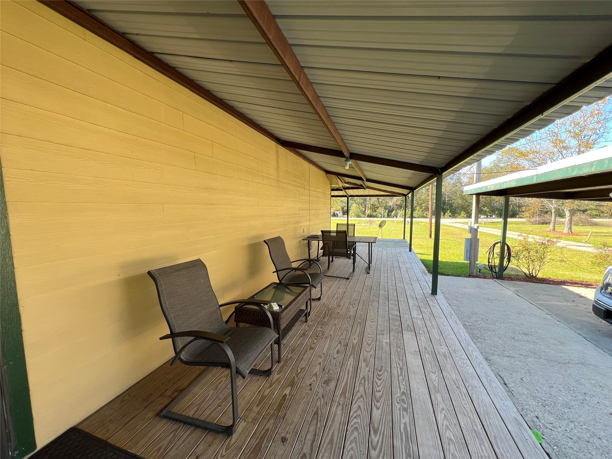 2723 Farm To Market 1010 Road Cleveland, TX 77327 - Photo 24 of 25 Front porch to rest and relax. Looking East to West