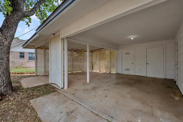 a view of a big room with large windows
