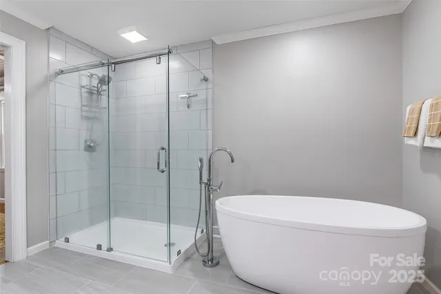 a white toilet sitting next to a bathroom