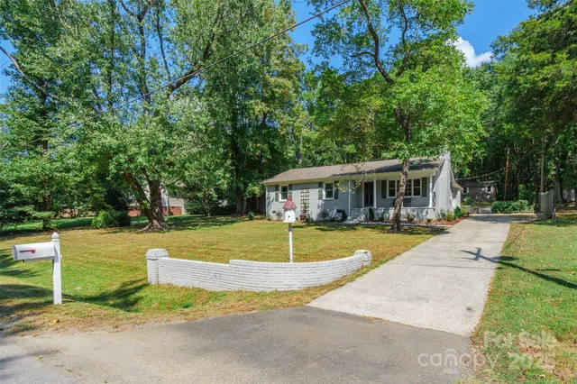 a view of a house with a swimming pool