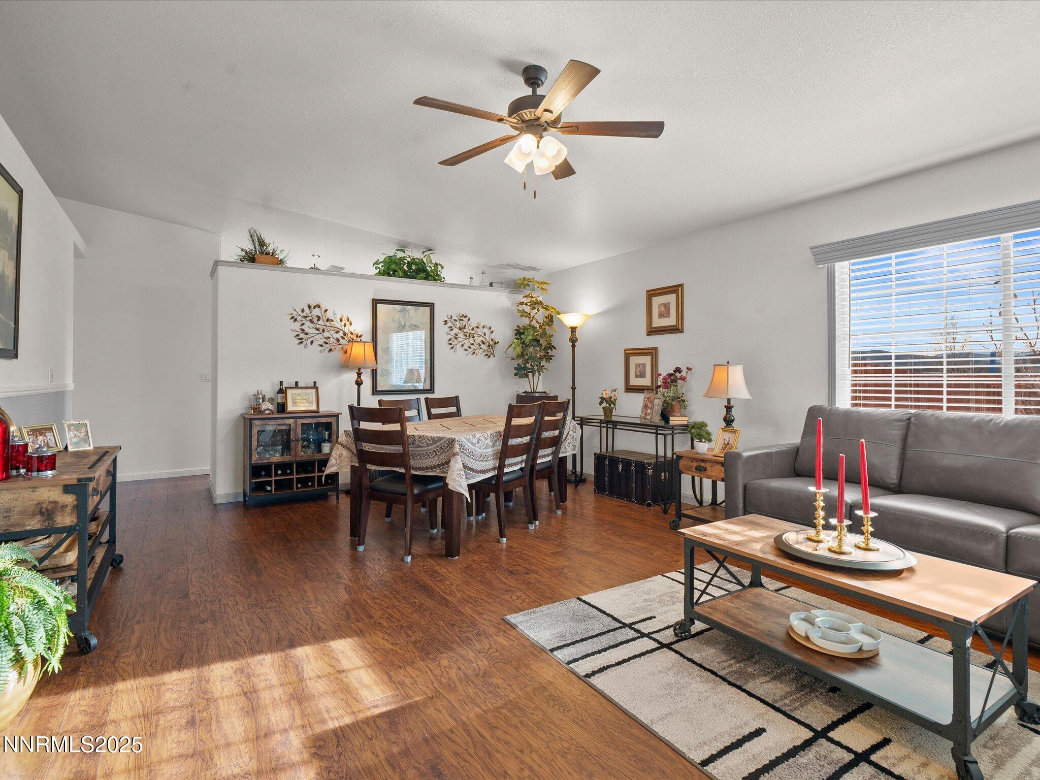 17634 Georgetown Court Reno, NV 89508 - Photo 14 of 56 a living room with lots of furniture a rug and a window