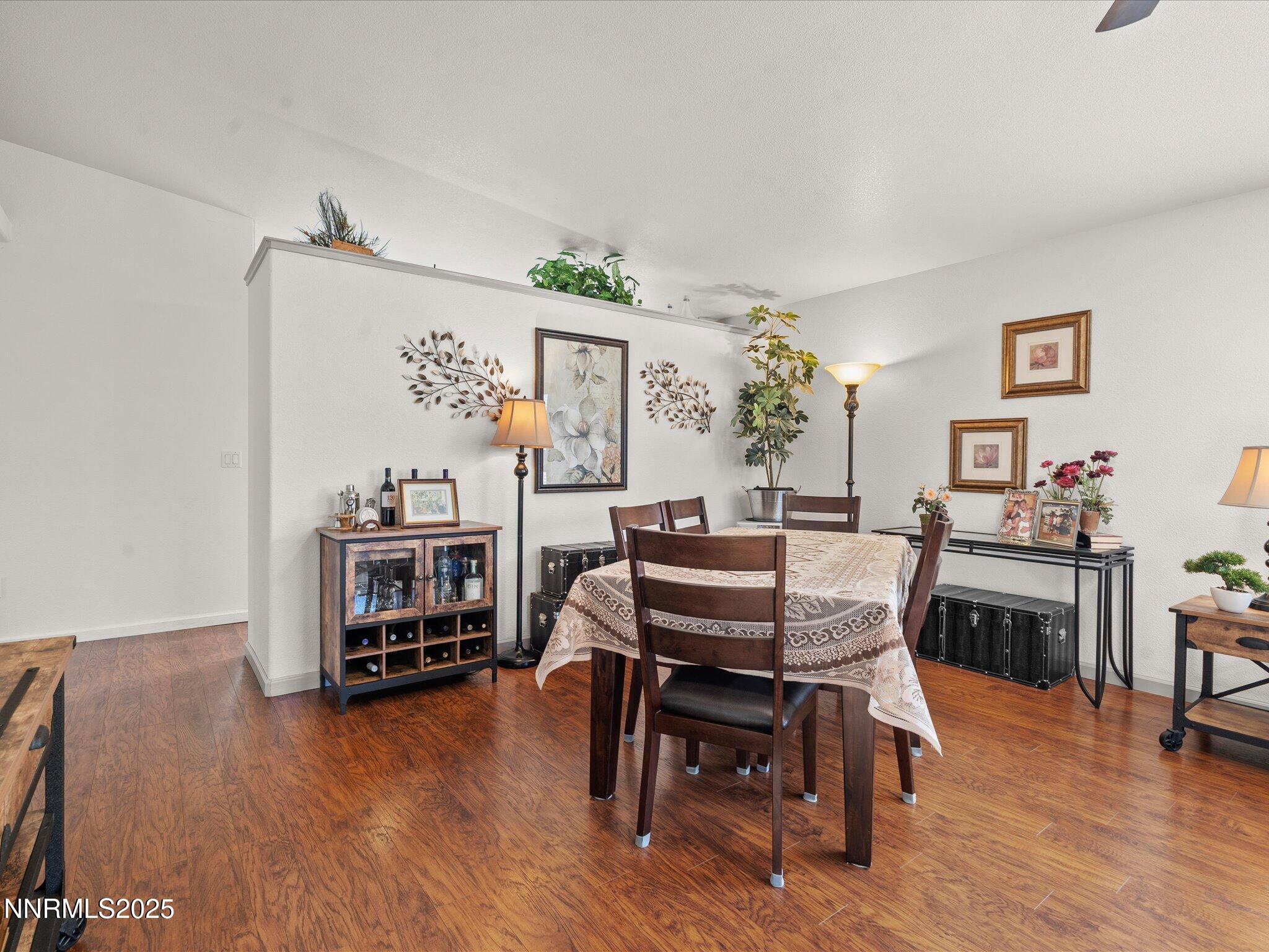 17634 Georgetown Court Reno, NV 89508 - Photo 17 of 56 a dining room with furniture and wooden floor
