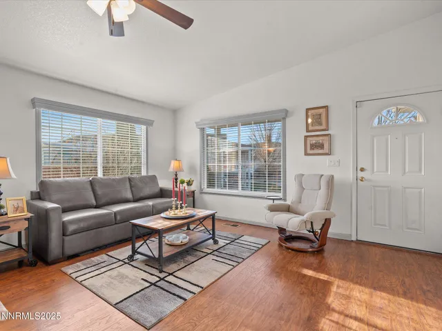 a view of a workspace with furniture and lounge chair