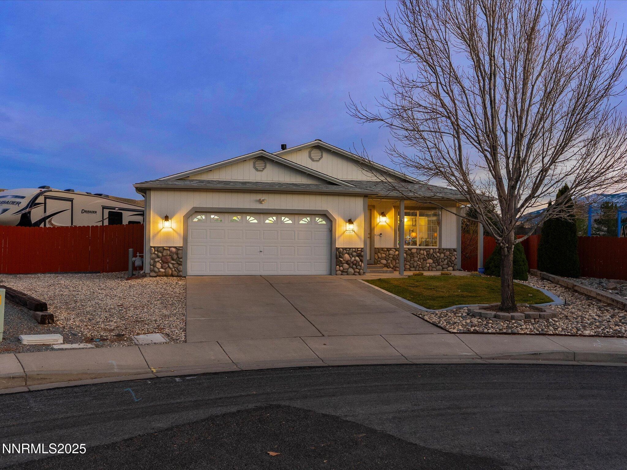 17634 Georgetown Court Reno, NV 89508 - Photo 2 of 56 a front view of a house with garden