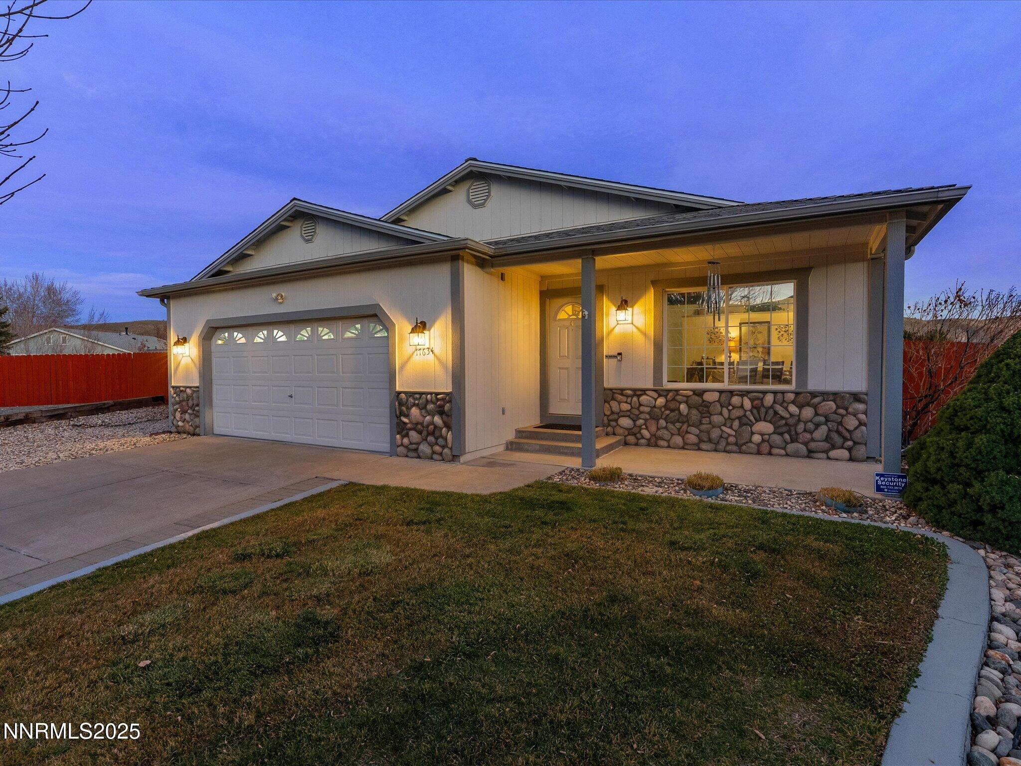 17634 Georgetown Court Reno, NV 89508 - Photo 3 of 56 a front view of a house with a yard