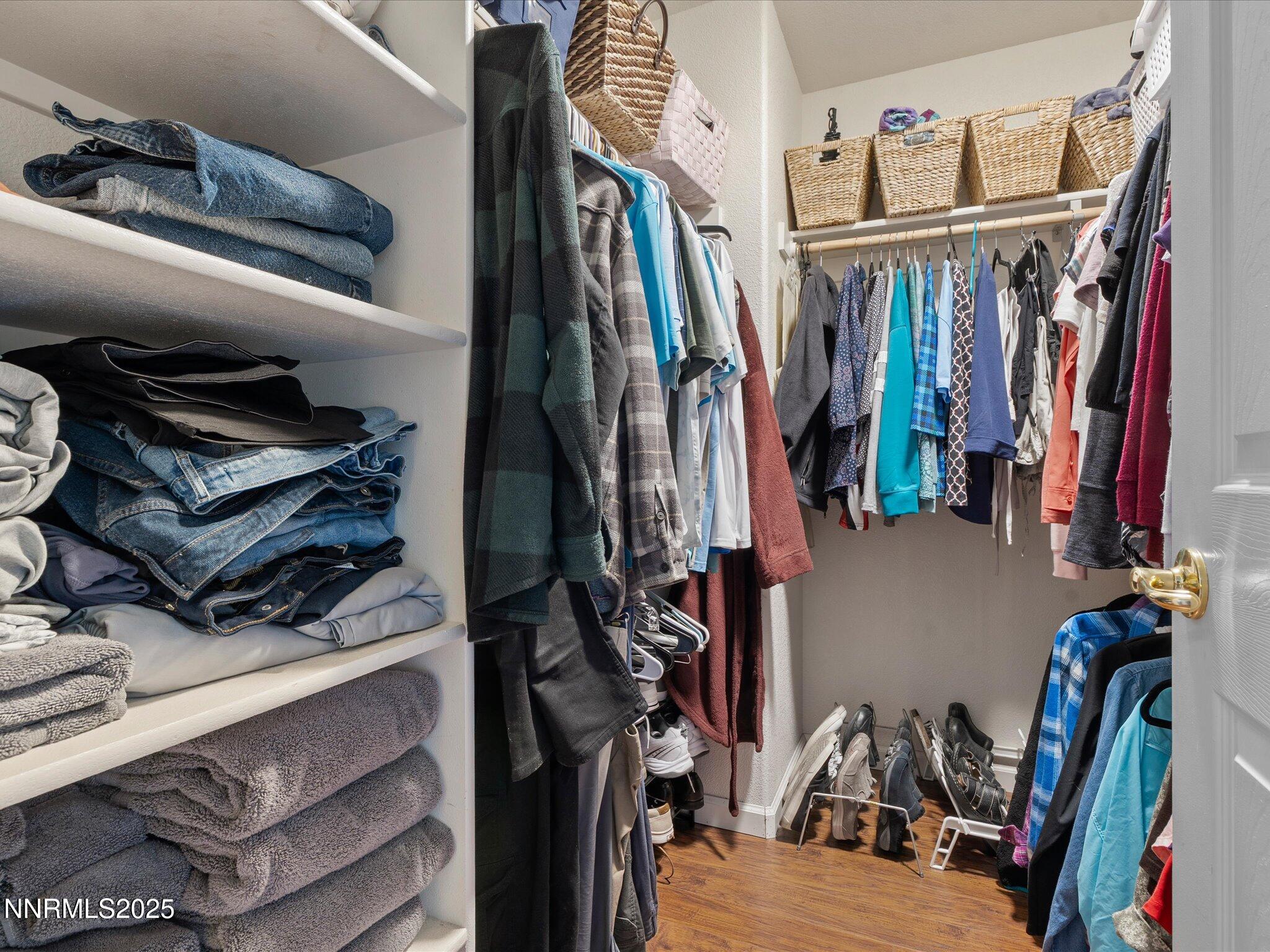 17634 Georgetown Court Reno, NV 89508 - Photo 33 of 56 a view of walk in closet with clothes and shoes
