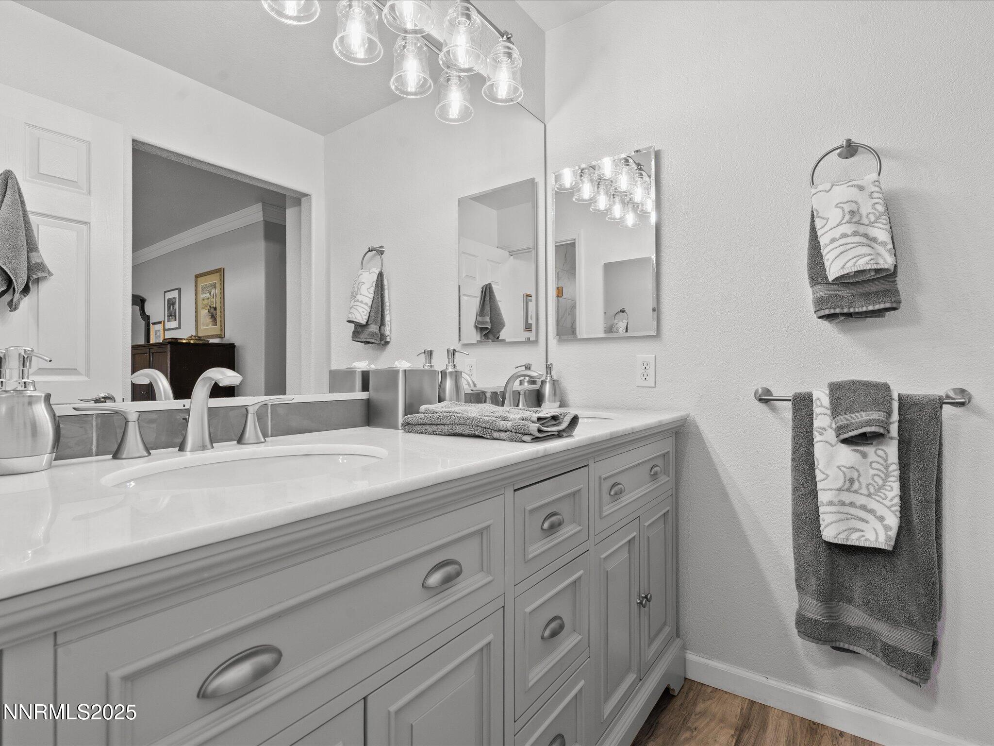 17634 Georgetown Court Reno, NV 89508 - Photo 34 of 56 a bathroom with double vanity sink and a mirror