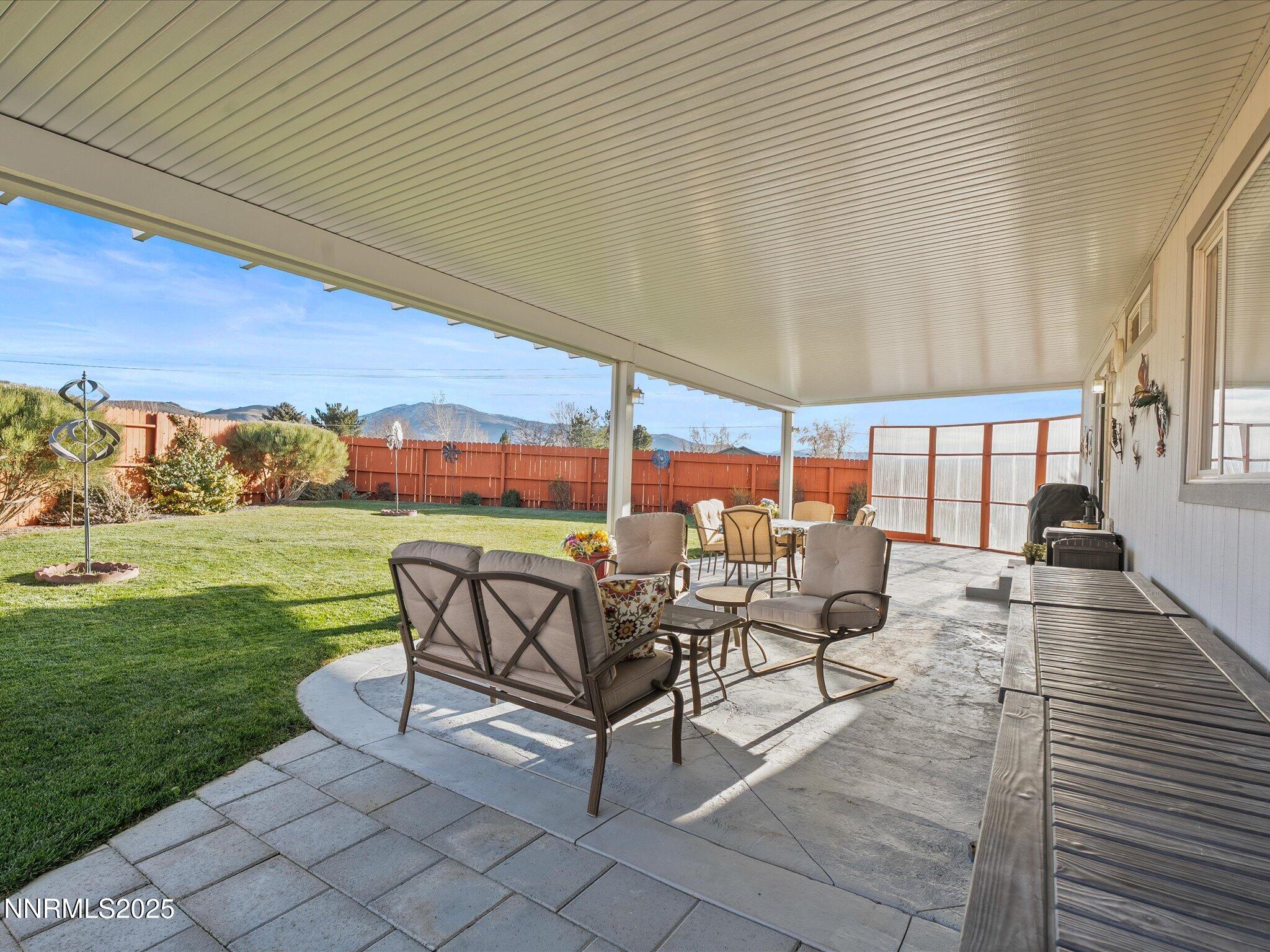 17634 Georgetown Court Reno, NV 89508 - Photo 44 of 56 a building outdoor space with patio furniture and garden