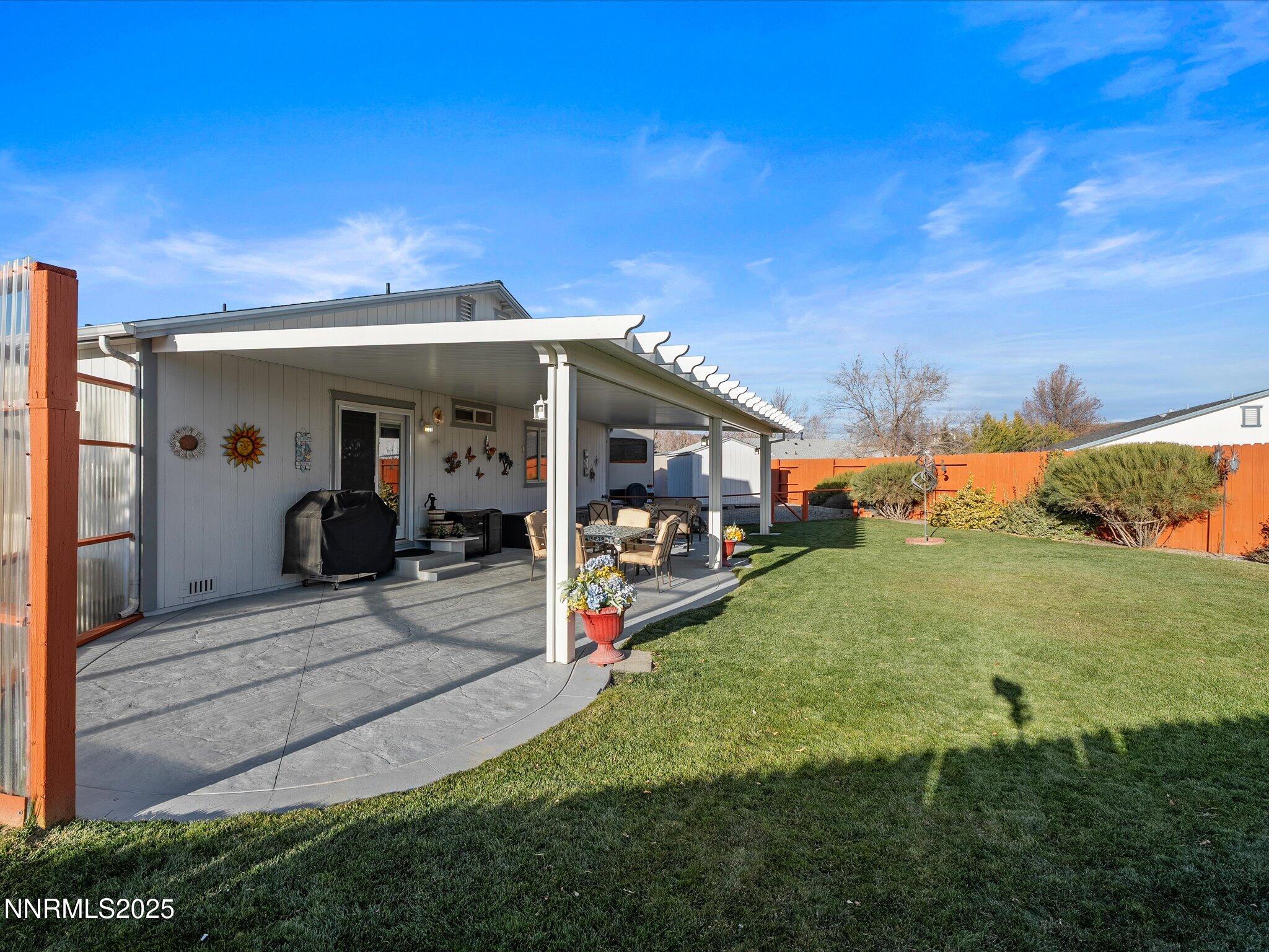 17634 Georgetown Court Reno, NV 89508 - Photo 46 of 56 a view of a porch with furniture and a yard