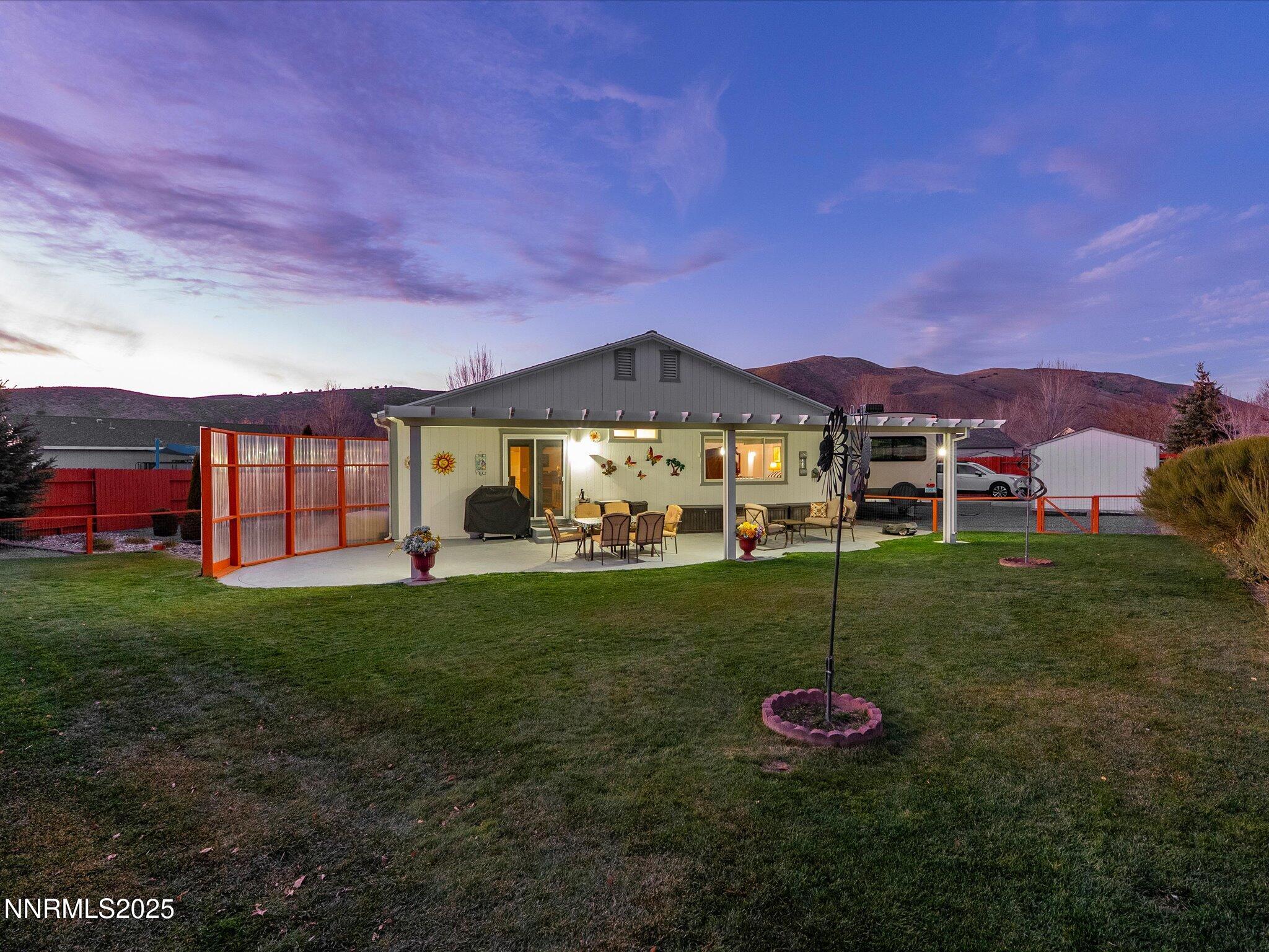 17634 Georgetown Court Reno, NV 89508 - Photo 5 of 56 a view of a house with a yard