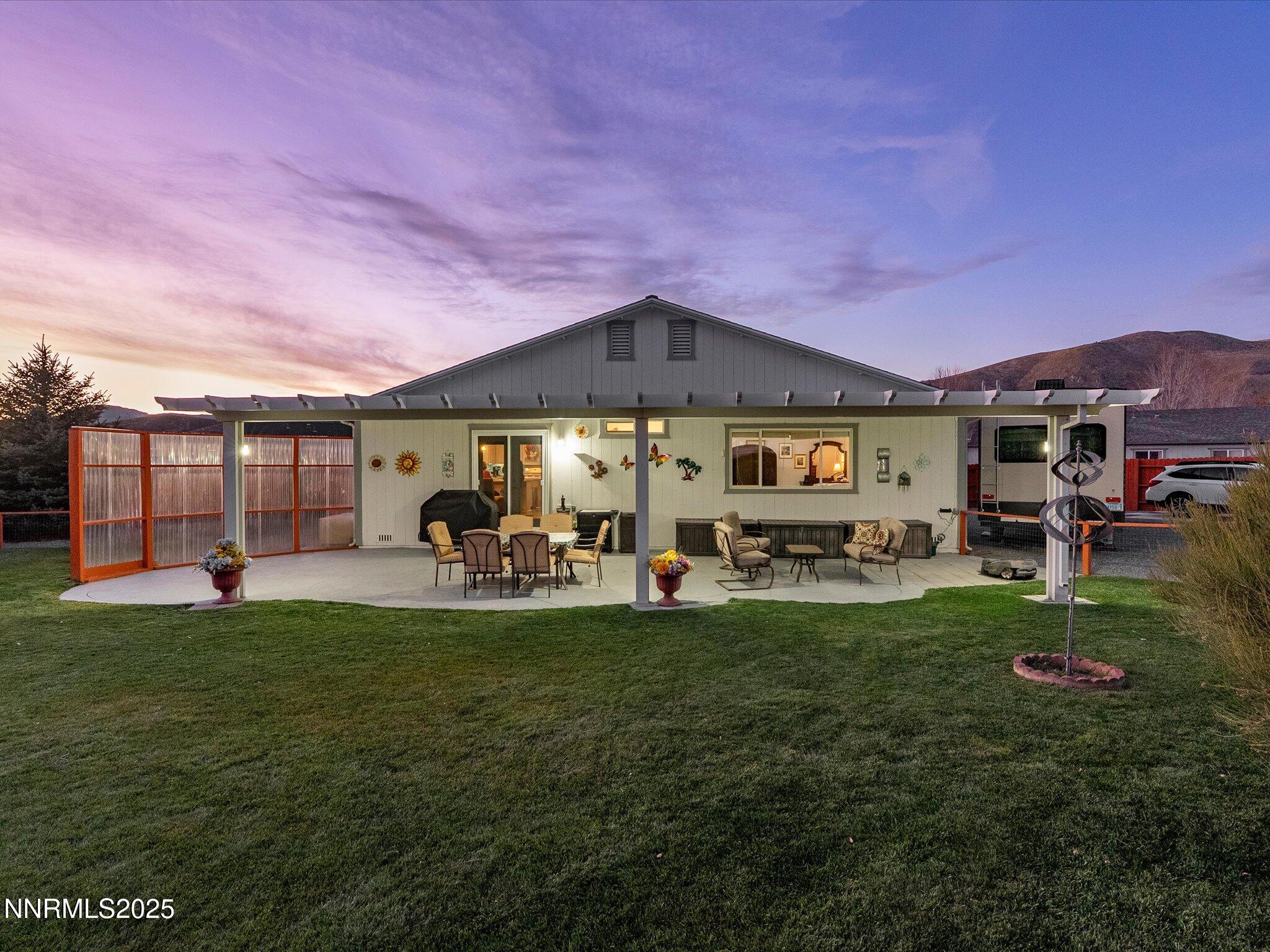 17634 Georgetown Court Reno, NV 89508 - Photo 7 of 56 a front view of a house with garden