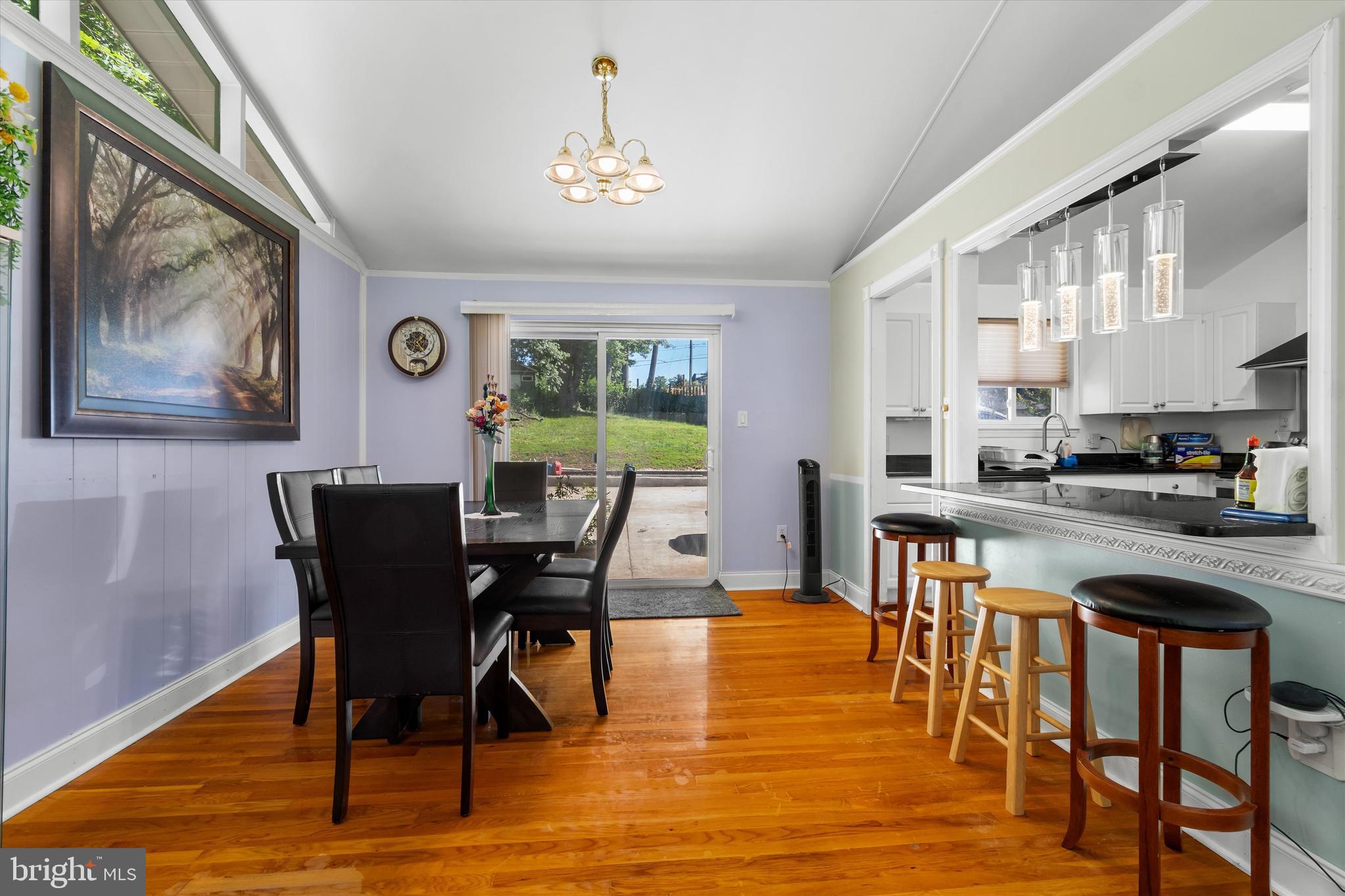 8304 Harland Drive Springfield, VA 22152 - Photo 9 of 39 a view of a dining room with furniture and wooden floor