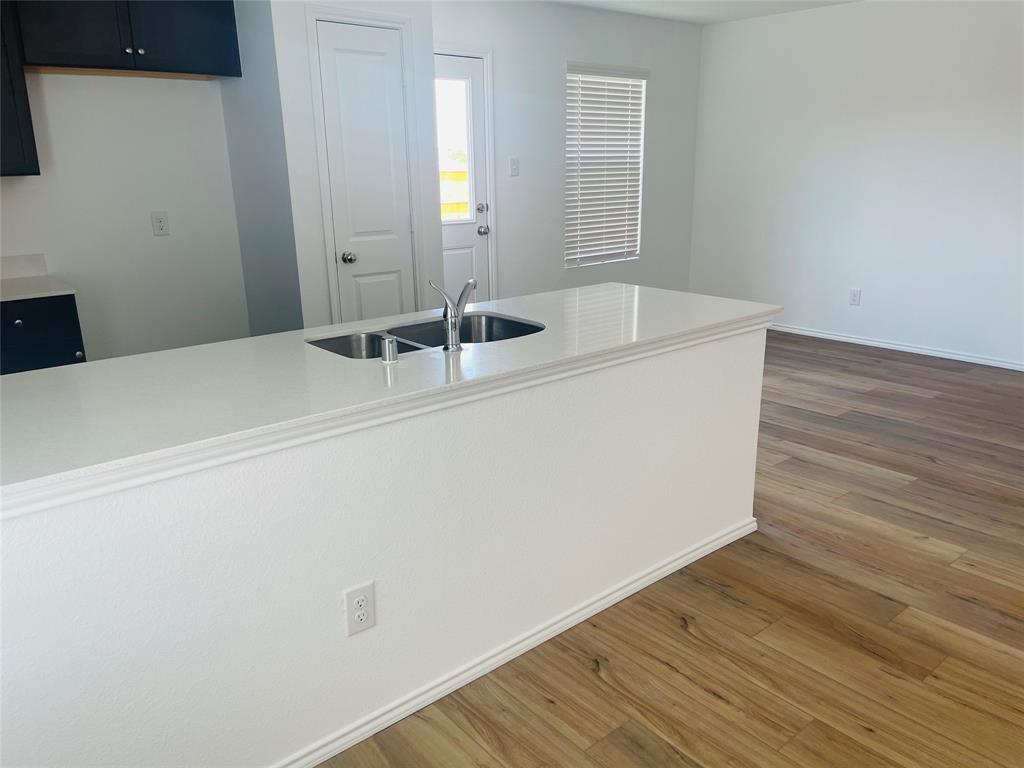 324 Red Rock Trail Haslet, TX 76052 - Photo 3 of 15 a room with wooden floor
