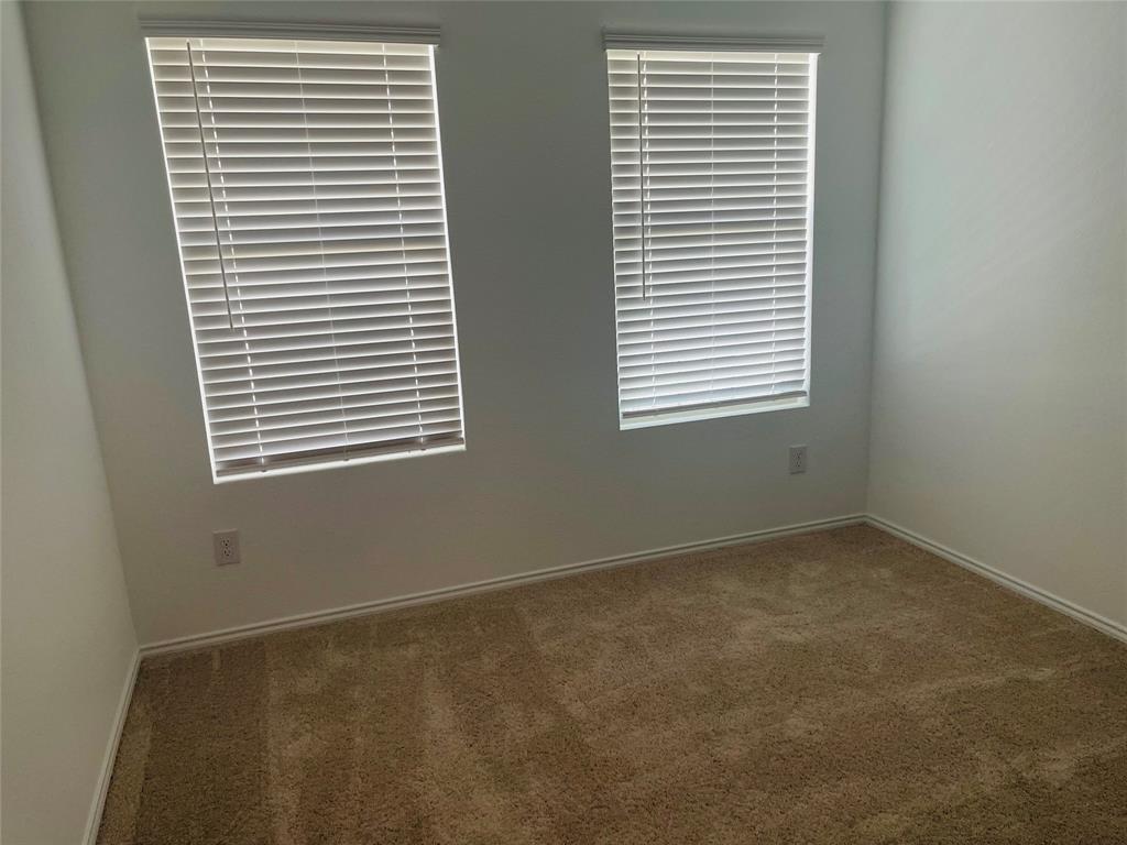 324 Red Rock Trail Haslet, TX 76052 - Photo 8 of 15 an empty room with a window