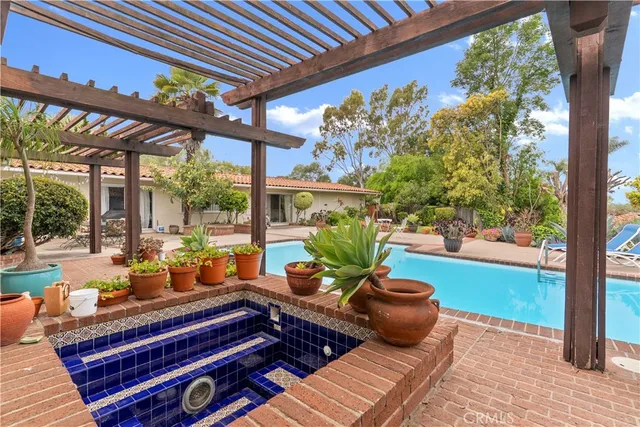 a room with patio lots of furniture and garden