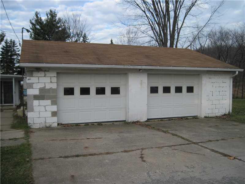 481 Rochester Road Rochester, PA 15074 - Photo 7 of 12 Parking Lot/Garage. 24x26 detached garage with electric sub panel and oil heater, 1 AD