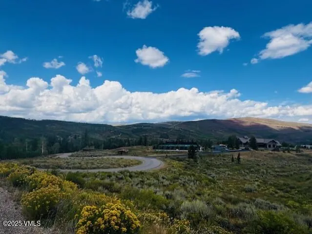 a view of a city with lots of green space