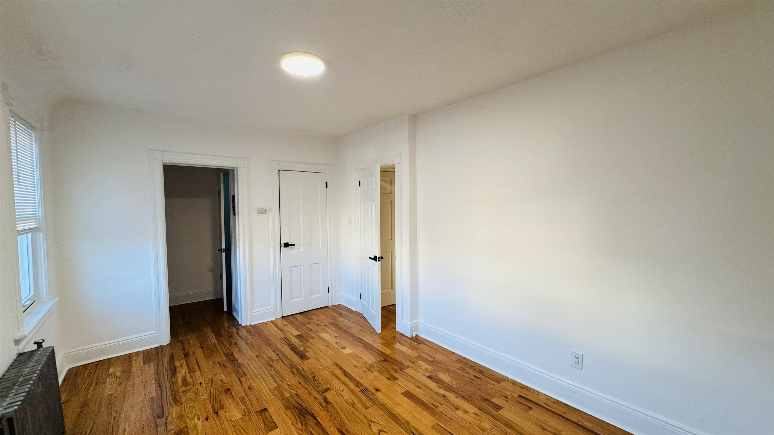 733 Hudson Avenue, Unit 2 Secaucus, NJ 07094 - Photo 7 of 13 a view of room with wooden floor