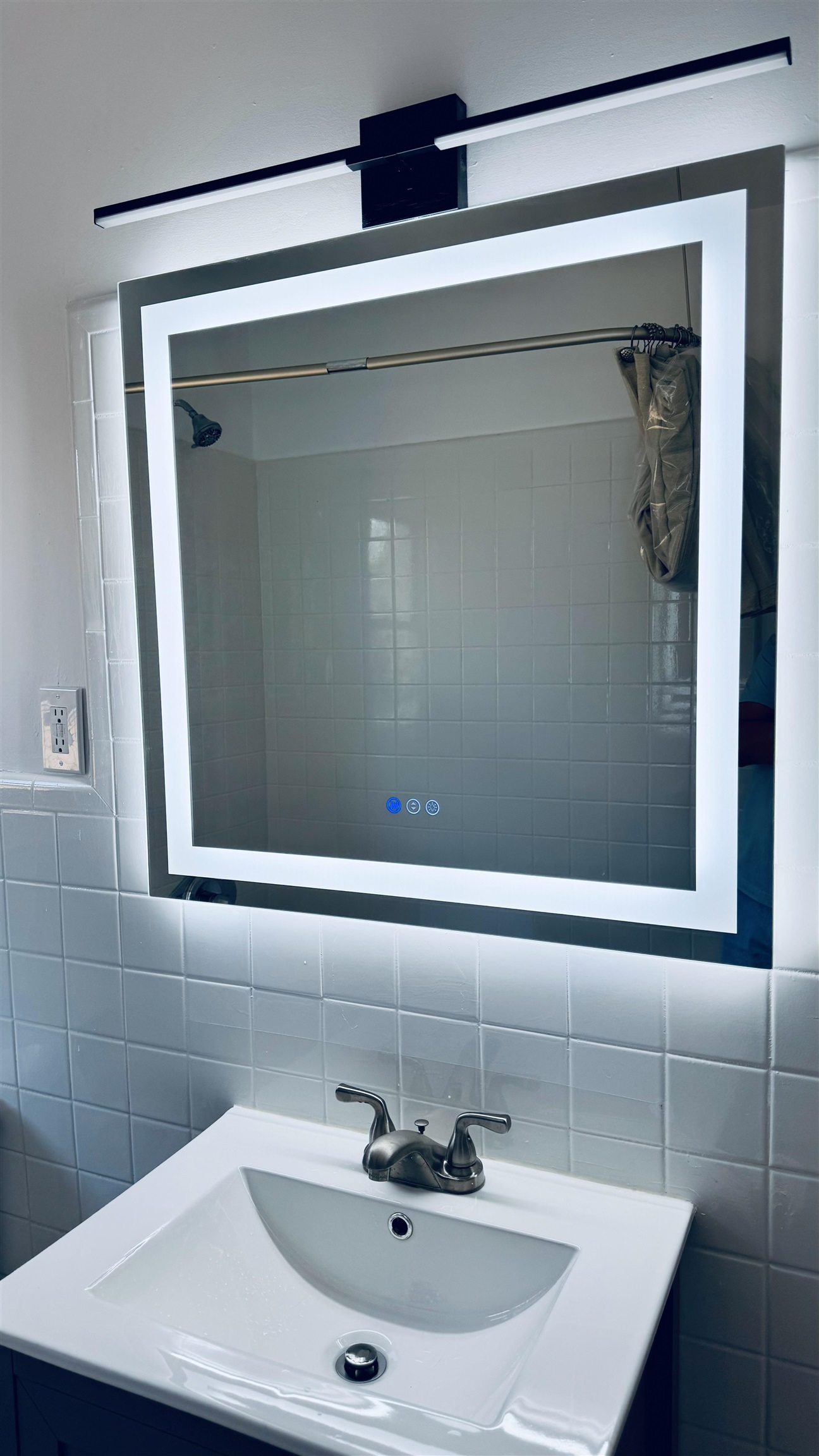 733 Hudson Avenue, Unit 2 Secaucus, NJ 07094 - Photo 8 of 13 a bathroom with a sink and a mirror