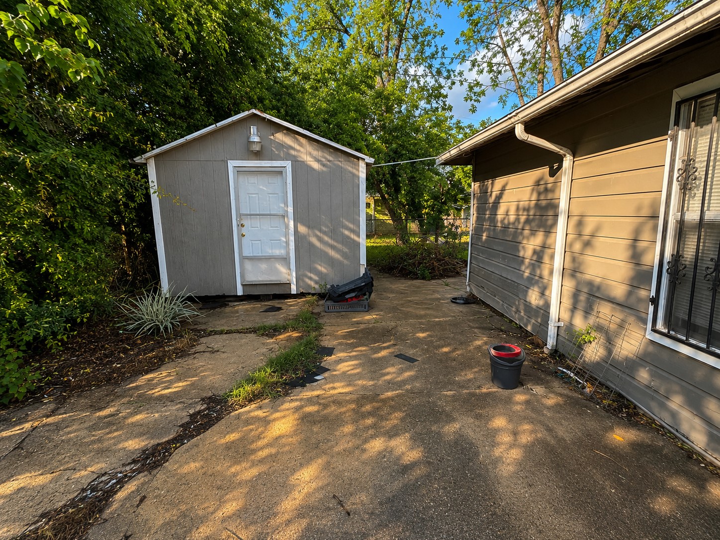 3727 Yosemite Street Houston, TX 77021 - Photo 13 of 15 a front view of a house with a yard and garage