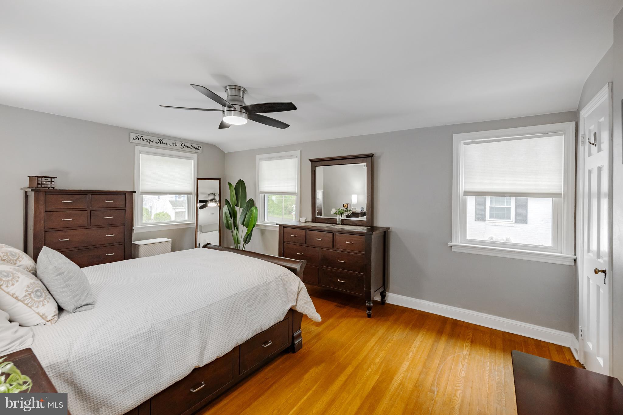 2710 Prescott Road Havertown, PA 19083 - Photo 22 of 38 a bedroom with a bed and wooden floor